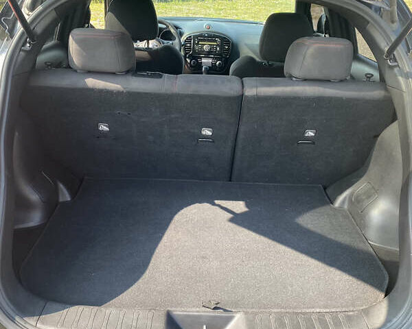 Черный Ниссан Жук, объемом двигателя 1.6 л и пробегом 169 тыс. км за 11800 $, фото 9 на Automoto.ua