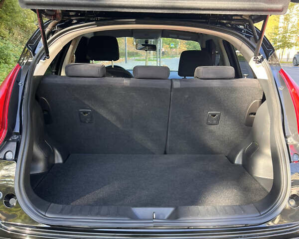 Чорний Ніссан Жук, об'ємом двигуна 1.6 л та пробігом 98 тис. км за 10500 $, фото 6 на Automoto.ua