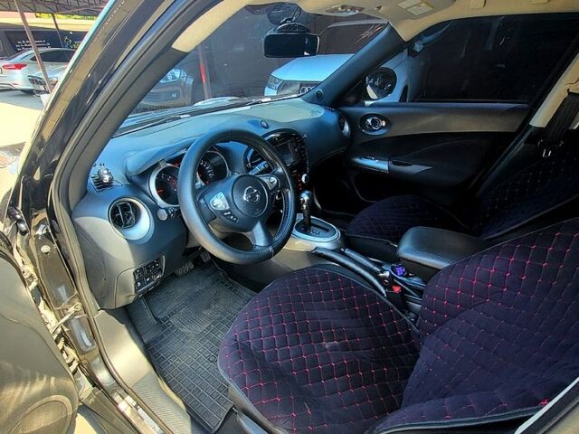 Чорний Ніссан Жук, об'ємом двигуна 1.6 л та пробігом 170 тис. км за 10500 $, фото 4 на Automoto.ua