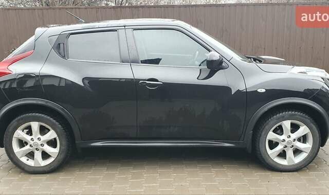 Чорний Ніссан Жук, об'ємом двигуна 1.6 л та пробігом 108 тис. км за 12000 $, фото 7 на Automoto.ua