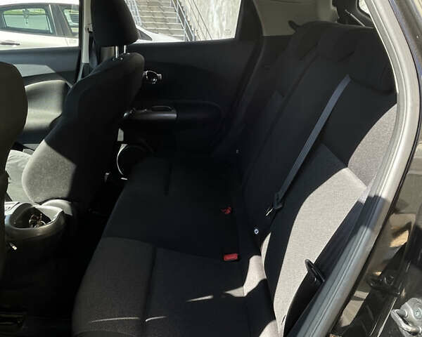 Черный Ниссан Жук, объемом двигателя 1.6 л и пробегом 103 тыс. км за 10700 $, фото 8 на Automoto.ua