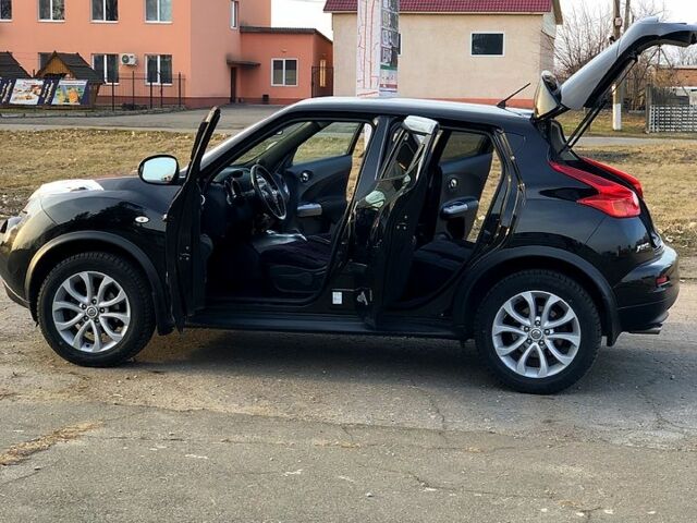 Черный Ниссан Жук, объемом двигателя 1.6 л и пробегом 154 тыс. км за 12300 $, фото 11 на Automoto.ua