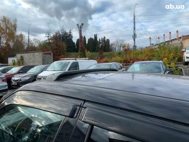 Черный Ниссан Жук, объемом двигателя 1.6 л и пробегом 100 тыс. км за 13590 $, фото 13 на Automoto.ua