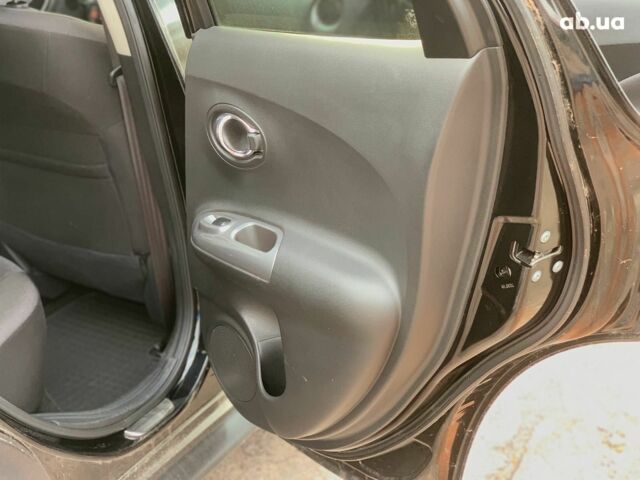 Черный Ниссан Жук, объемом двигателя 1.6 л и пробегом 100 тыс. км за 13590 $, фото 18 на Automoto.ua