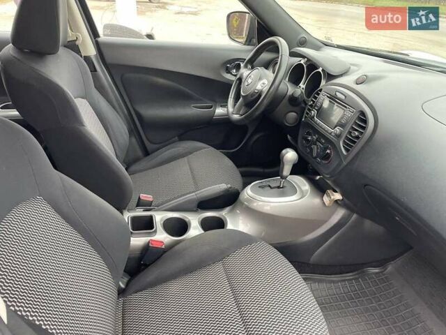 Черный Ниссан Жук, объемом двигателя 1.62 л и пробегом 160 тыс. км за 10499 $, фото 4 на Automoto.ua