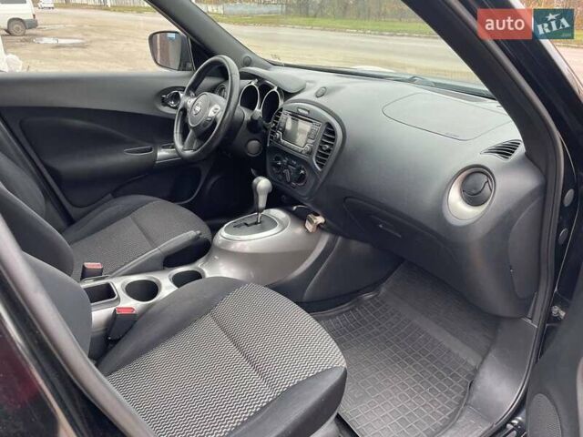 Черный Ниссан Жук, объемом двигателя 1.62 л и пробегом 160 тыс. км за 10499 $, фото 7 на Automoto.ua