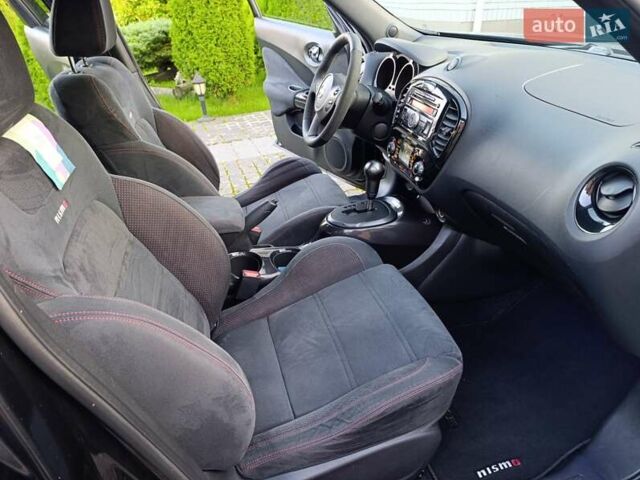 Черный Ниссан Жук, объемом двигателя 1.6 л и пробегом 105 тыс. км за 11200 $, фото 10 на Automoto.ua