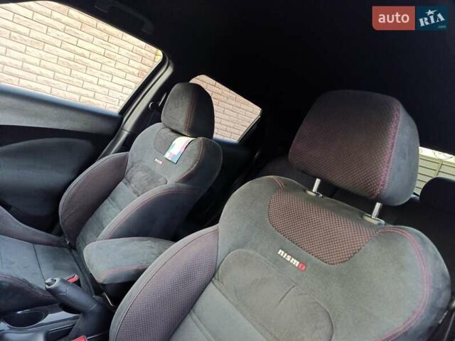 Черный Ниссан Жук, объемом двигателя 1.6 л и пробегом 105 тыс. км за 11200 $, фото 9 на Automoto.ua