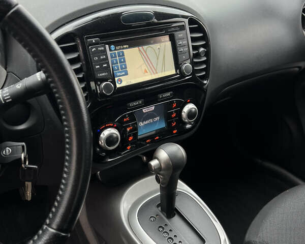 Черный Ниссан Жук, объемом двигателя 1.6 л и пробегом 172 тыс. км за 11300 $, фото 17 на Automoto.ua