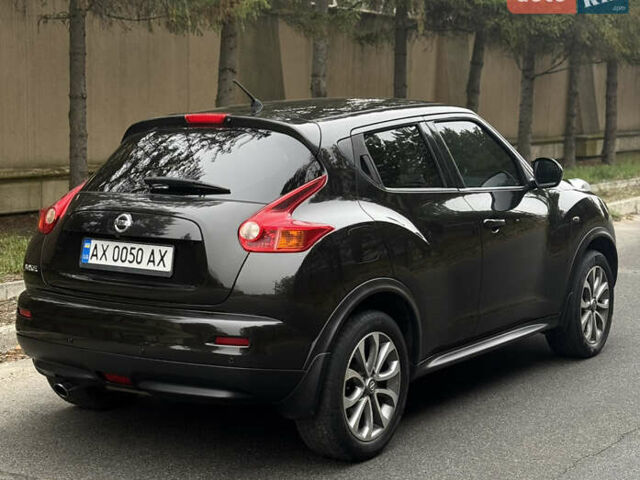 Чорний Ніссан Жук, об'ємом двигуна 1.62 л та пробігом 78 тис. км за 11800 $, фото 8 на Automoto.ua