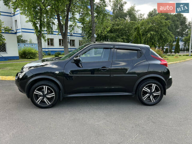 Черный Ниссан Жук, объемом двигателя 1.6 л и пробегом 172 тыс. км за 11600 $, фото 2 на Automoto.ua