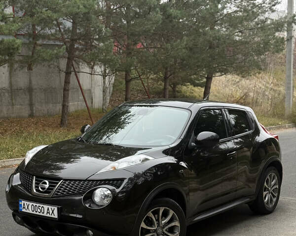 Чорний Ніссан Жук, об'ємом двигуна 1.62 л та пробігом 78 тис. км за 11800 $, фото 1 на Automoto.ua