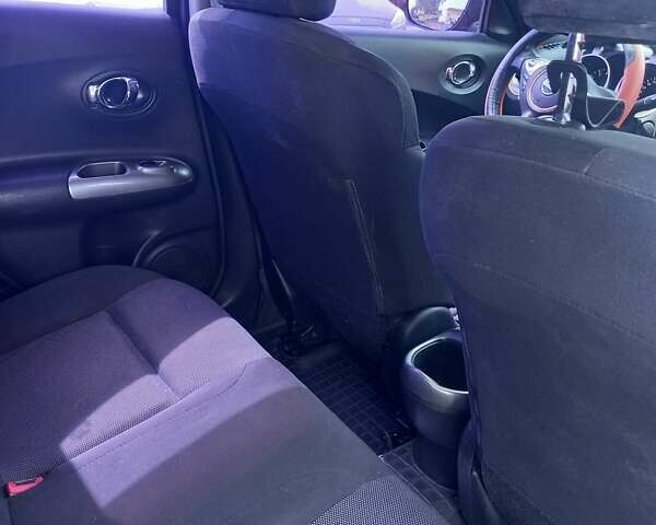 Черный Ниссан Жук, объемом двигателя 1.6 л и пробегом 101 тыс. км за 10500 $, фото 12 на Automoto.ua