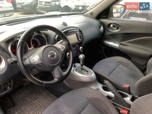 Черный Ниссан Жук, объемом двигателя 1.6 л и пробегом 100 тыс. км за 13390 $, фото 22 на Automoto.ua