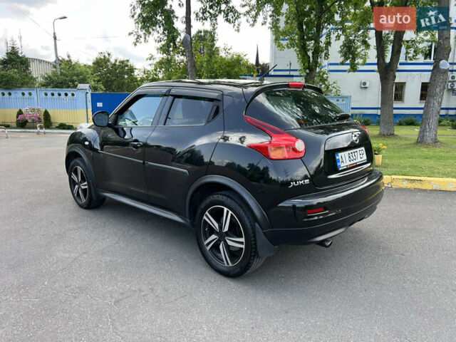 Черный Ниссан Жук, объемом двигателя 1.6 л и пробегом 172 тыс. км за 11600 $, фото 1 на Automoto.ua