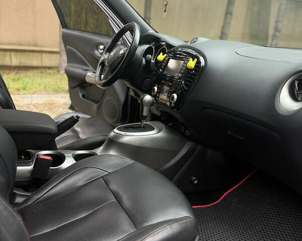 Чорний Ніссан Жук, об'ємом двигуна 1.62 л та пробігом 78 тис. км за 11800 $, фото 19 на Automoto.ua