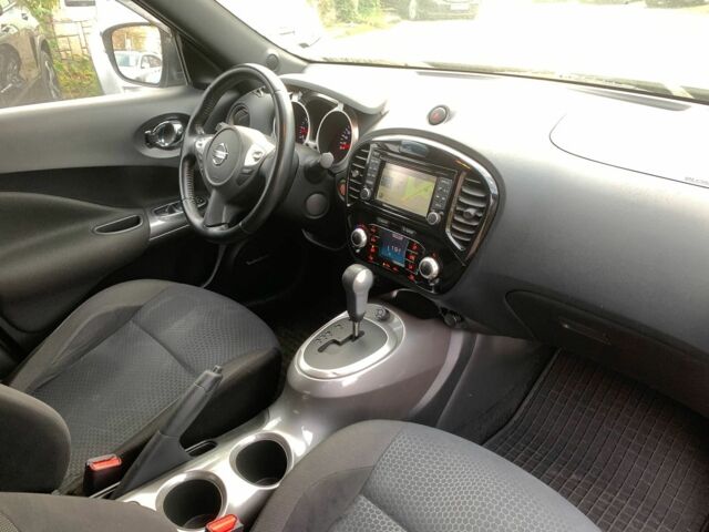 Черный Ниссан Жук, объемом двигателя 1.6 л и пробегом 100 тыс. км за 13590 $, фото 26 на Automoto.ua