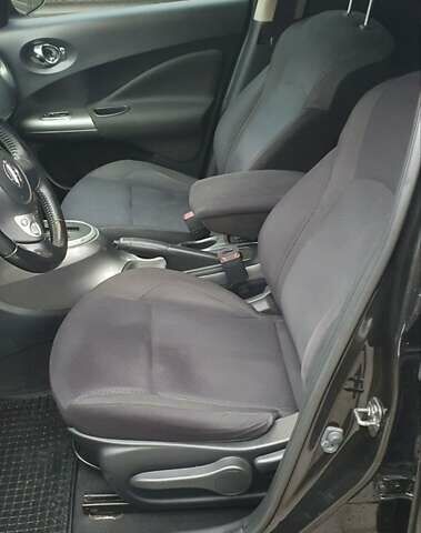 Чорний Ніссан Жук, об'ємом двигуна 1.6 л та пробігом 108 тис. км за 12000 $, фото 10 на Automoto.ua