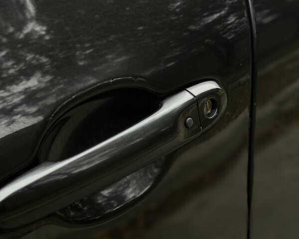 Чорний Ніссан Жук, об'ємом двигуна 1.62 л та пробігом 78 тис. км за 11800 $, фото 24 на Automoto.ua