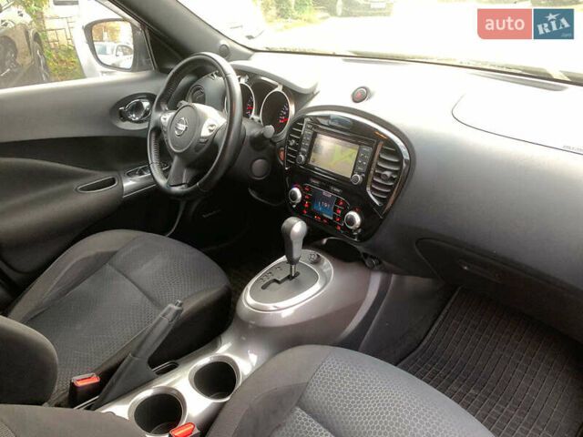 Черный Ниссан Жук, объемом двигателя 1.6 л и пробегом 100 тыс. км за 13390 $, фото 26 на Automoto.ua