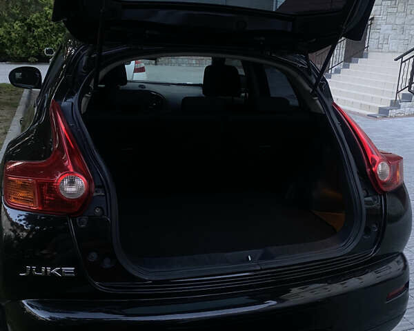 Черный Ниссан Жук, объемом двигателя 1.6 л и пробегом 103 тыс. км за 10700 $, фото 13 на Automoto.ua