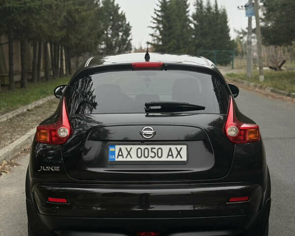 Чорний Ніссан Жук, об'ємом двигуна 1.62 л та пробігом 78 тис. км за 11800 $, фото 10 на Automoto.ua