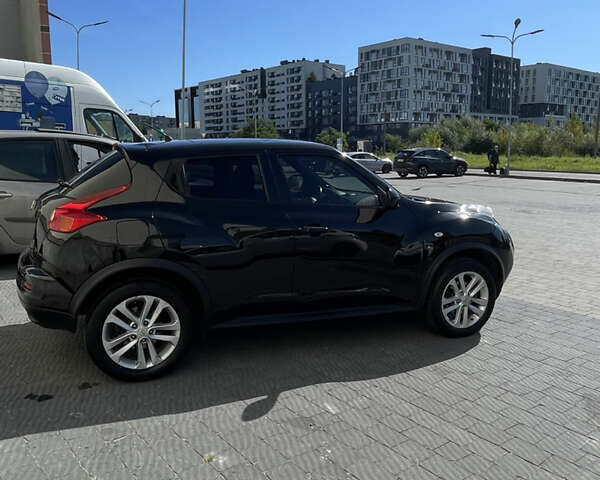 Черный Ниссан Жук, объемом двигателя 1.6 л и пробегом 103 тыс. км за 10700 $, фото 11 на Automoto.ua