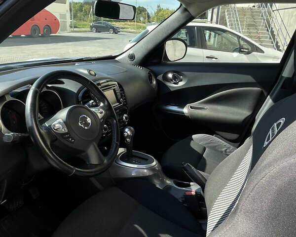 Черный Ниссан Жук, объемом двигателя 1.6 л и пробегом 103 тыс. км за 10700 $, фото 5 на Automoto.ua