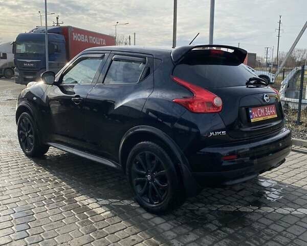 Черный Ниссан Жук, объемом двигателя 1.6 л и пробегом 188 тыс. км за 8699 $, фото 4 на Automoto.ua