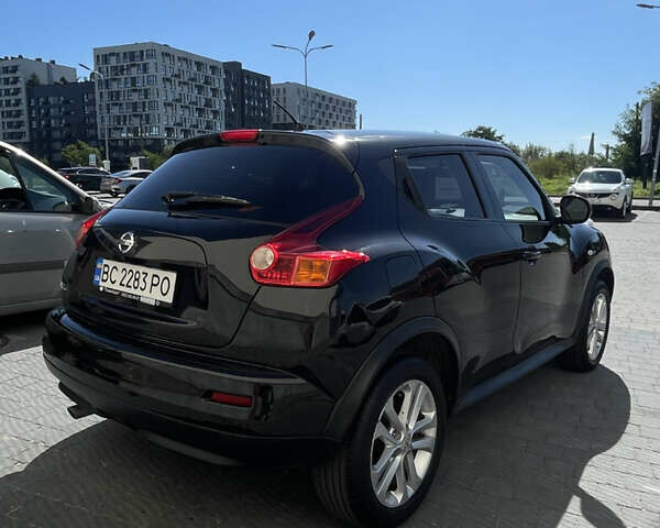 Черный Ниссан Жук, объемом двигателя 1.6 л и пробегом 103 тыс. км за 10700 $, фото 10 на Automoto.ua