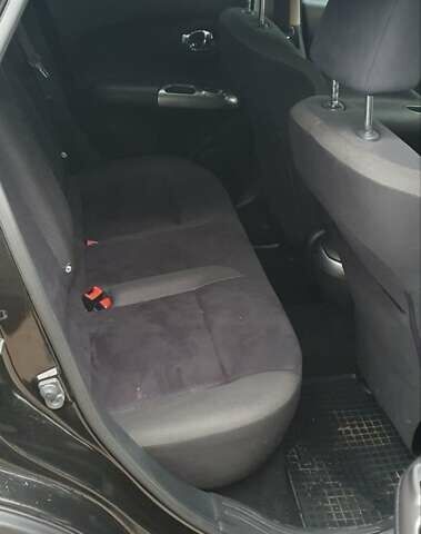 Чорний Ніссан Жук, об'ємом двигуна 1.6 л та пробігом 108 тис. км за 12000 $, фото 11 на Automoto.ua