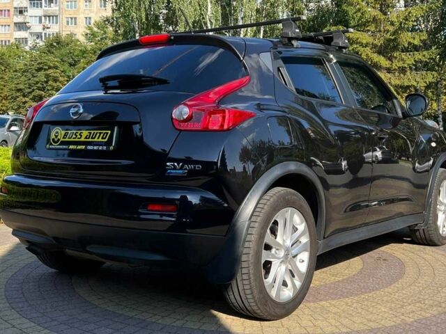 Черный Ниссан Жук, объемом двигателя 1.6 л и пробегом 215 тыс. км за 8999 $, фото 6 на Automoto.ua