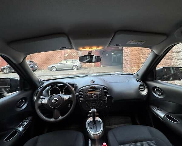 Черный Ниссан Жук, объемом двигателя 1.6 л и пробегом 101 тыс. км за 10700 $, фото 3 на Automoto.ua