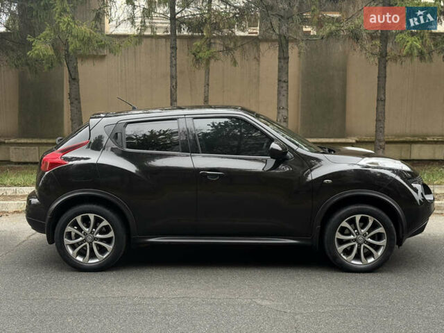 Чорний Ніссан Жук, об'ємом двигуна 1.62 л та пробігом 78 тис. км за 11800 $, фото 7 на Automoto.ua