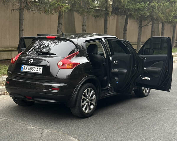 Чорний Ніссан Жук, об'ємом двигуна 1.62 л та пробігом 78 тис. км за 11800 $, фото 25 на Automoto.ua