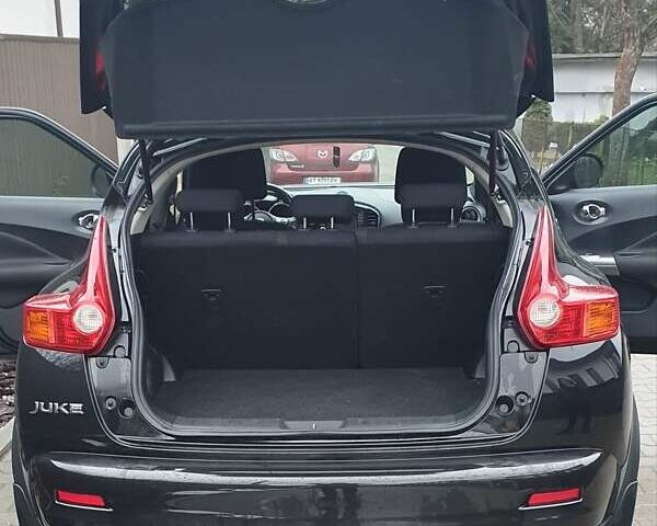 Чорний Ніссан Жук, об'ємом двигуна 1.6 л та пробігом 108 тис. км за 12000 $, фото 5 на Automoto.ua