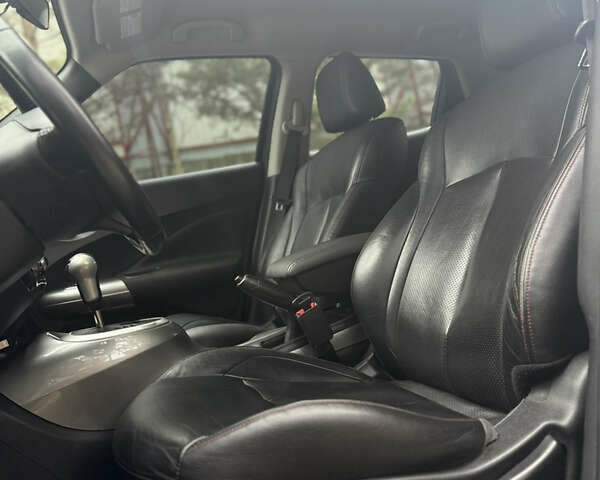 Чорний Ніссан Жук, об'ємом двигуна 1.62 л та пробігом 78 тис. км за 11800 $, фото 16 на Automoto.ua