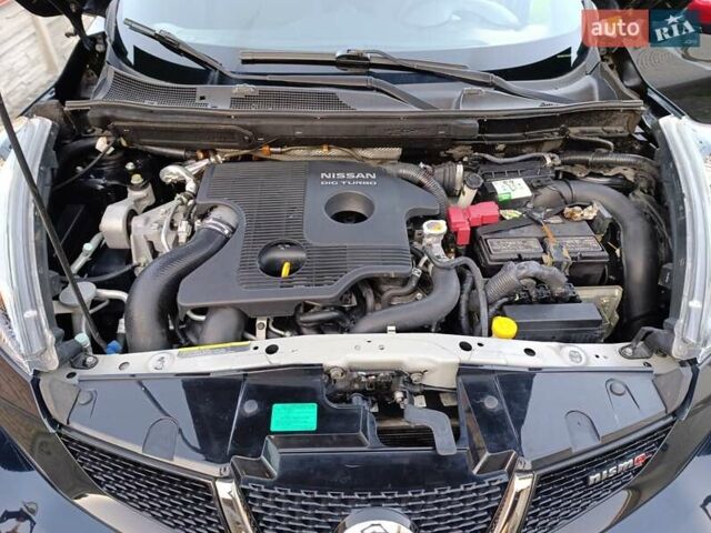 Черный Ниссан Жук, объемом двигателя 1.6 л и пробегом 105 тыс. км за 11200 $, фото 17 на Automoto.ua