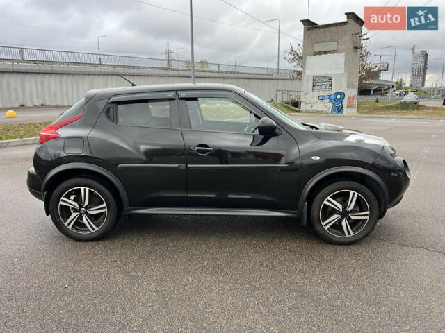 Черный Ниссан Жук, объемом двигателя 1.6 л и пробегом 172 тыс. км за 10900 $, фото 5 на Automoto.ua