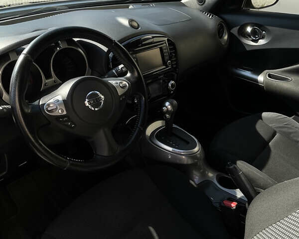 Черный Ниссан Жук, объемом двигателя 1.6 л и пробегом 103 тыс. км за 10700 $, фото 6 на Automoto.ua