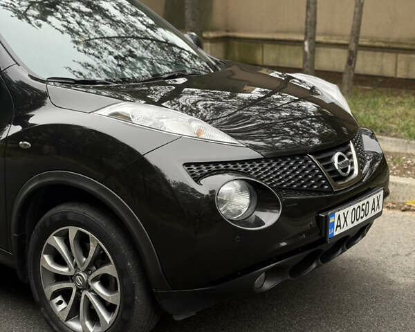 Чорний Ніссан Жук, об'ємом двигуна 1.62 л та пробігом 78 тис. км за 11800 $, фото 6 на Automoto.ua