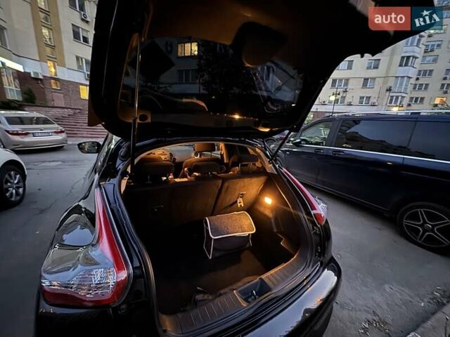 Черный Ниссан Жук, объемом двигателя 1.6 л и пробегом 101 тыс. км за 10700 $, фото 4 на Automoto.ua