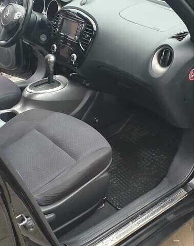 Чорний Ніссан Жук, об'ємом двигуна 1.6 л та пробігом 108 тис. км за 12000 $, фото 13 на Automoto.ua