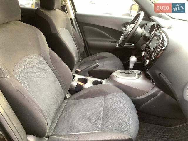 Черный Ниссан Жук, объемом двигателя 1.6 л и пробегом 100 тыс. км за 13390 $, фото 27 на Automoto.ua