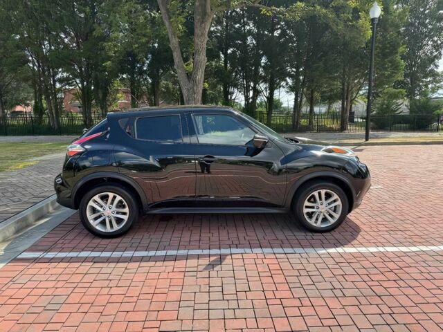 Черный Ниссан Жук, объемом двигателя 1.6 л и пробегом 80 тыс. км за 5400 $, фото 4 на Automoto.ua