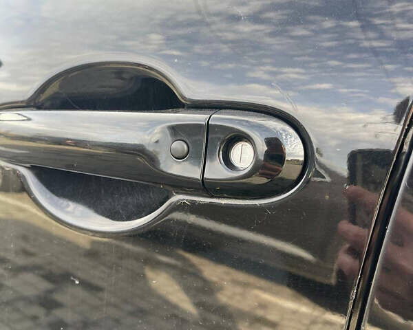 Черный Ниссан Жук, объемом двигателя 1.6 л и пробегом 120 тыс. км за 10900 $, фото 4 на Automoto.ua