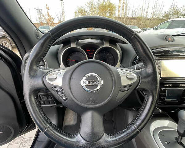 Черный Ниссан Жук, объемом двигателя 1.6 л и пробегом 120 тыс. км за 10900 $, фото 17 на Automoto.ua