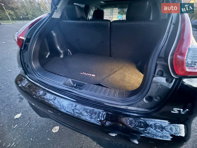 Черный Ниссан Жук, объемом двигателя 1.6 л и пробегом 111 тыс. км за 12800 $, фото 21 на Automoto.ua