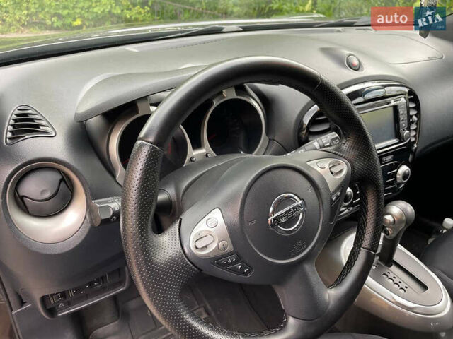 Черный Ниссан Жук, объемом двигателя 1.6 л и пробегом 110 тыс. км за 13700 $, фото 24 на Automoto.ua