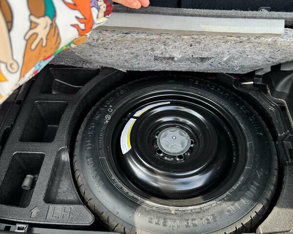 Черный Ниссан Жук, объемом двигателя 1.62 л и пробегом 70 тыс. км за 12500 $, фото 15 на Automoto.ua